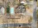 Aerial view showing home, pool, and driveway at 110 Creekside Dr, Fort Mill, SC 29715