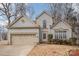 Two-story house with beige siding, a two-car garage, and a well-maintained lawn at 110 Creekside Dr, Fort Mill, SC 29715