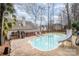 Inviting backyard oasis featuring a sparkling pool and a waterslide at 110 Creekside Dr, Fort Mill, SC 29715