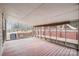 Relaxing screened porch with wooden deck and backyard access at 110 Creekside Dr, Fort Mill, SC 29715