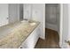 Bathroom boasts a double vanity with granite countertop at 11212 Carmel Chace Dr # 101, Charlotte, NC 28226