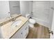 Updated bathroom with granite vanity and tub/shower at 11212 Carmel Chace Dr # 101, Charlotte, NC 28226