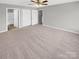 Spacious bedroom with carpet flooring and ceiling fan at 11212 Carmel Chace Dr # 101, Charlotte, NC 28226