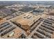 Aerial view of community, showing homes, school, and surrounding areas at 12613 Stoneybrook Station Pkwy, Huntersville, NC 28078