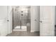 Bathroom with a large walk-in shower and built-in bench at 12613 Stoneybrook Station Pkwy, Huntersville, NC 28078