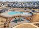 Aerial view of community pool, playground, and surrounding homes at 12613 Stoneybrook Station Pkwy, Huntersville, NC 28078