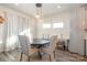 Charming dining area with round table and four chairs at 12613 Stoneybrook Station Pkwy, Huntersville, NC 28078