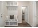 Entryway with bench seating and built-in storage at 12613 Stoneybrook Station Pkwy, Huntersville, NC 28078