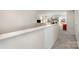 Upstairs hallway with built-in shelving and carpet at 12613 Stoneybrook Station Pkwy, Huntersville, NC 28078