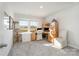 Home office with wood desk and neutral decor at 12613 Stoneybrook Station Pkwy, Huntersville, NC 28078