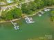 Lake community with multiple docks and boat slips for easy access to the water at 133 Castaway Trl, Mooresville, NC 28117