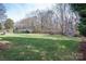 Large backyard with a shed and a partially fenced perimeter at 133 Castaway Trl, Mooresville, NC 28117