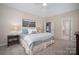 Bright main bedroom with a vaulted ceiling features carpeted floors and neutral paint at 133 Castaway Trl, Mooresville, NC 28117