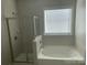 Bathroom with shower and garden tub at 1336 Stonecrest Blvd, Fort Mill, SC 29708