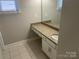 Bathroom with granite countertop and single vanity at 1336 Stonecrest Blvd, Fort Mill, SC 29708