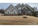 Two-story house with stone and shingle accents, landscaping, and a large front yard at 1336 Stonecrest Blvd, Fort Mill, SC 29708