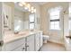 Bright bathroom with double vanity and updated fixtures at 1380 Secret Path Dr, Fort Mill, SC 29708