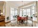 Bright breakfast nook with table and chairs, and view of backyard patio at 1380 Secret Path Dr, Fort Mill, SC 29708