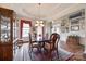 Formal dining room with hardwood floors, chandelier, and art at 1380 Secret Path Dr, Fort Mill, SC 29708