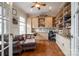 Spacious home office with built-in shelving and hardwood floors at 1380 Secret Path Dr, Fort Mill, SC 29708