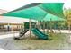 Playground area with shade canopy, climbing structures, and slides at 1380 Secret Path Dr, Fort Mill, SC 29708