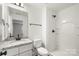 Clean bathroom with granite vanity, shower, and toilet at 1506 Collinston Dr, Gastonia, NC 28052