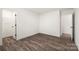 Bright bedroom with hardwood floors and access to a closet at 1506 Collinston Dr, Gastonia, NC 28052