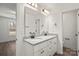 Double vanity bathroom with granite countertop and modern fixtures at 1508 Collinston Dr, Gastonia, NC 28052