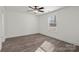 Bedroom with ceiling fan and large window at 1508 Collinston Dr, Gastonia, NC 28052