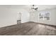 Bright and airy living area with hardwood floors and neutral walls at 1508 Collinston Dr, Gastonia, NC 28052