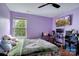 Bedroom with double bed and a gaming setup at 2111 Bennett Woods Ct, Charlotte, NC 28216