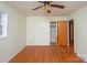 Spacious bedroom with hardwood floors and a closet at 218 Kingsway Cir, Charlotte, NC 28214