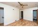 Bedroom with hardwood floors and access to bathroom at 218 Kingsway Cir, Charlotte, NC 28214