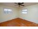 Bedroom with hardwood floors and two windows at 218 Kingsway Cir, Charlotte, NC 28214