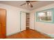 Bedroom with hardwood floors and built-in shelving at 218 Kingsway Cir, Charlotte, NC 28214