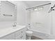 Clean bathroom with white vanity, bathtub, and shower at 2512 Heathershire Ln, Matthews, NC 28105