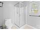 Clean bathroom with a shower and toilet at 2512 Heathershire Ln, Matthews, NC 28105