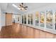 Bright sunroom with sliding doors leading to backyard at 2512 Heathershire Ln, Matthews, NC 28105