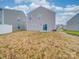 Backyard view of home with sliding glass doors at 2643 Idared Dr, Dallas, NC 28034