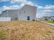 Backyard view of home with sliding glass doors at 2643 Idared Dr, Dallas, NC 28034