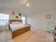 Spacious primary bedroom with large bed and ample natural light at 2643 Idared Dr, Dallas, NC 28034