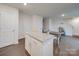 Eat-in kitchen with island and white cabinets at 2643 Idared Dr, Dallas, NC 28034