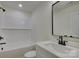 Clean bathroom with white subway tile and a bathtub at 2712 Yellow Bell Way, Monroe, NC 28112