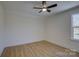 Simple bedroom with hardwood floors and a window at 2712 Yellow Bell Way, Monroe, NC 28112