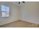 Bright bedroom with ceiling fan and wood flooring at 2712 Yellow Bell Way, Monroe, NC 28112