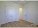 Bright bedroom with double doors and hardwood floors at 2712 Yellow Bell Way, Monroe, NC 28112