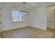 Spacious dining room with hardwood floors and a large window at 2712 Yellow Bell Way, Monroe, NC 28112