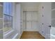 Large walk-in closet with window and built-in shelves at 2712 Yellow Bell Way, Monroe, NC 28112