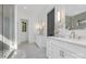 Spa-like bathroom with double vanity and walk-in shower at 308 Dover Ave, Charlotte, NC 28209