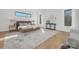 Bright bedroom with a large bed, hardwood floors, and plenty of natural light at 308 Dover Ave, Charlotte, NC 28209